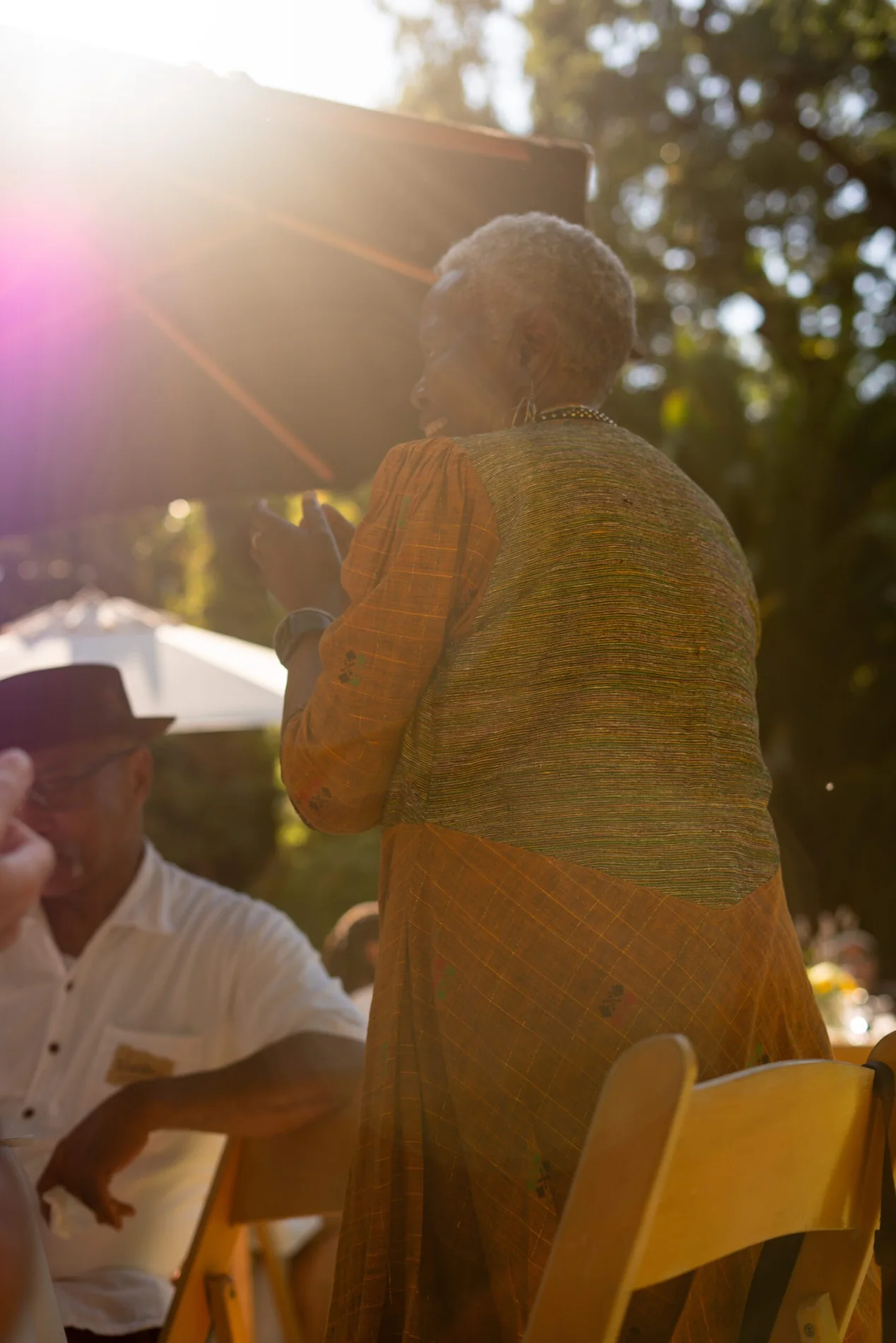 An elder sharing in the Harvest gathering