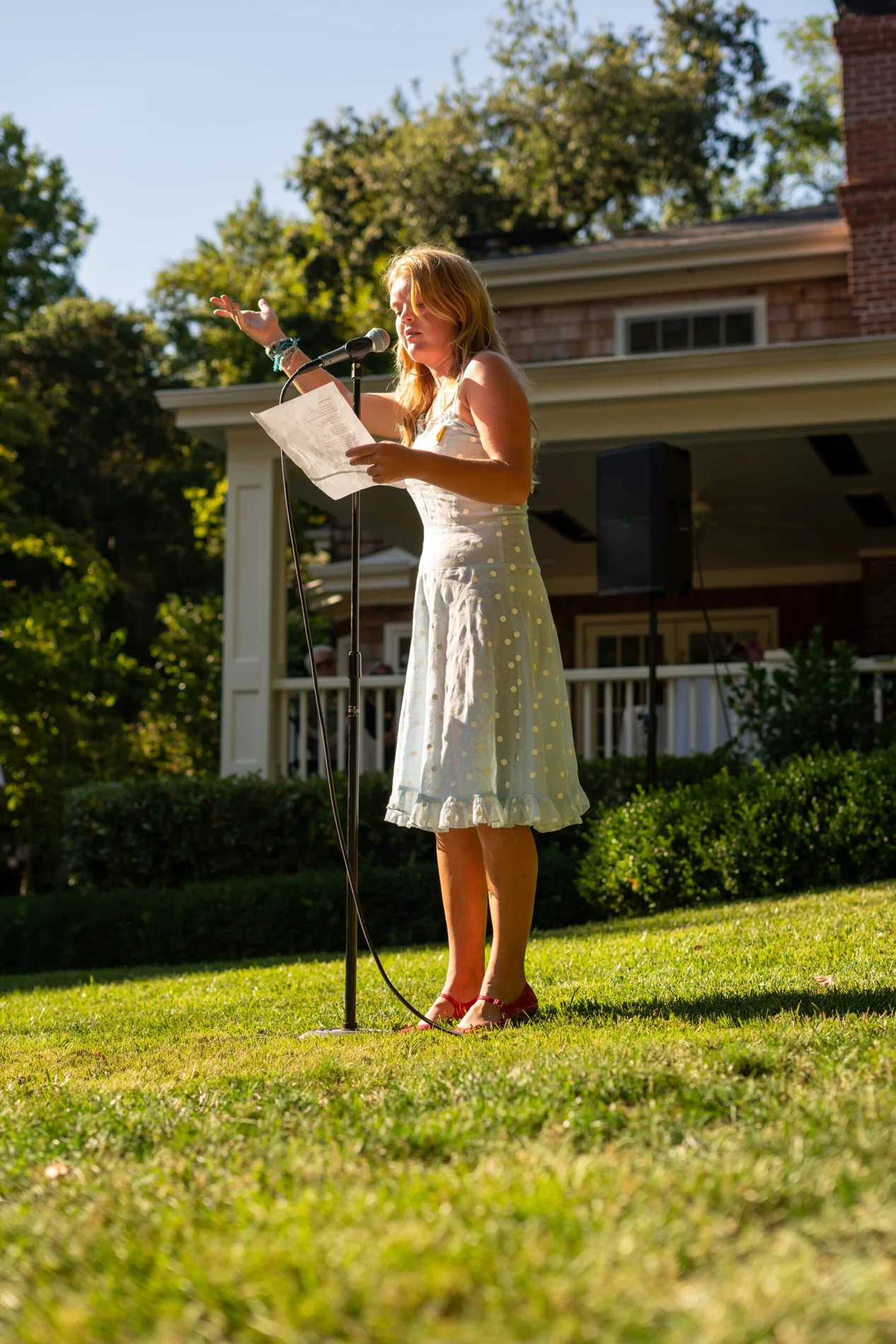 A poet speaking at an early Harvest gathering